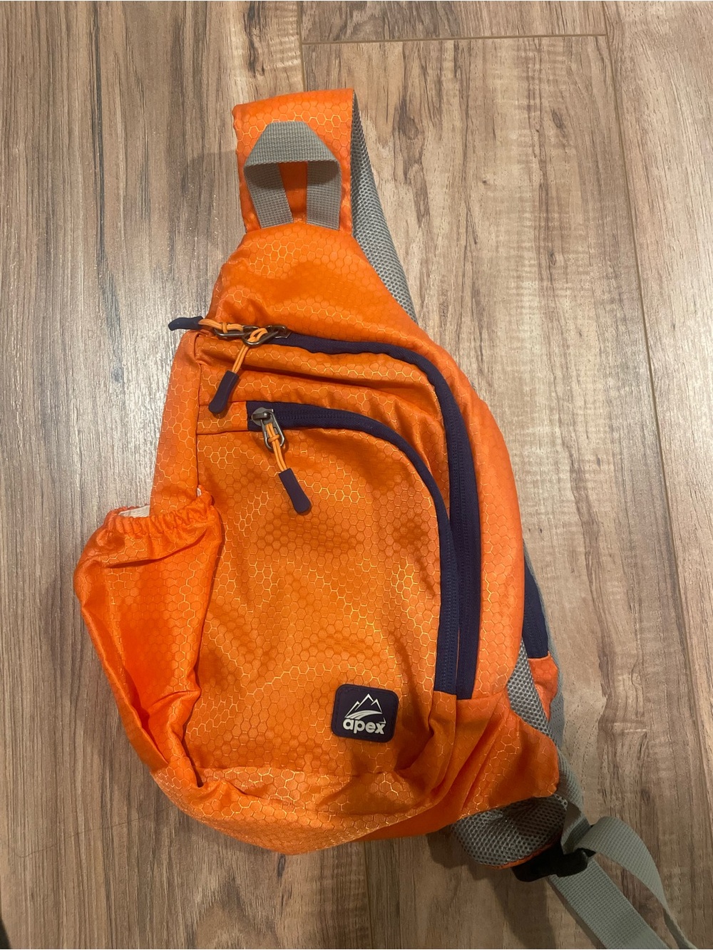Apex Bright Orange Crossbody Sling Pack with Navy Accents